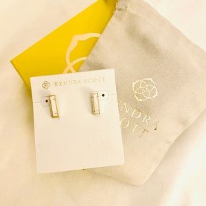 Kendra Scott lady studs, gold and mother of pearl.